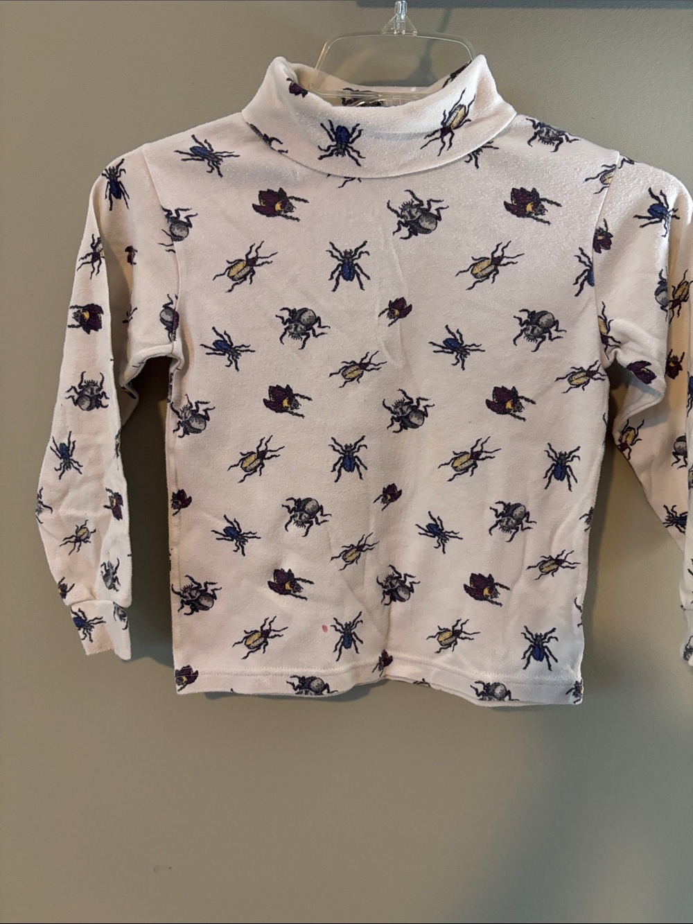Garanimals Cream Turtleneck Top with Bug Print in Navy, Purple & Yellow